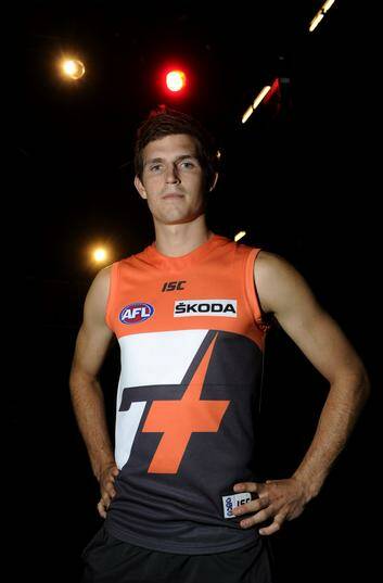 Phil Davis models the Greater Western Sydney Giants' Canberra jersey. Photo: Lannon Harley