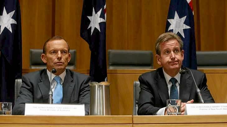 Prime Minister Tony Abbott with NSW Premier Barry O'Farrell during the COAG press conference at Parliament House in Canberra. Photo: Andrew Meares