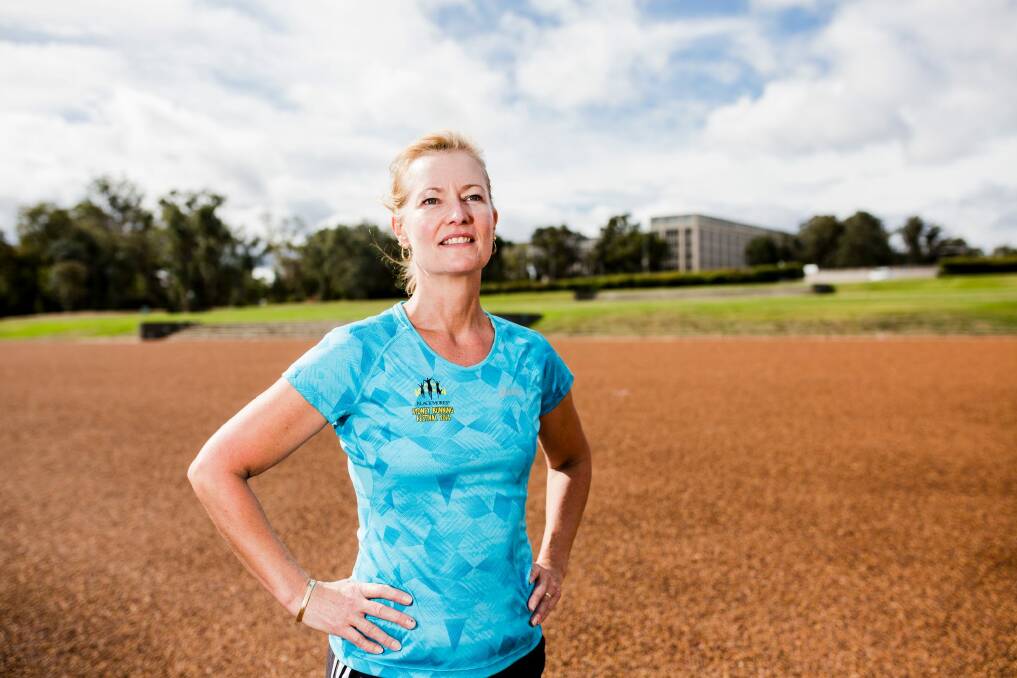 Wendy Smith of Harrison is training for her first marathon at the Australian Outback Marathon on red dirt around Uluru. Photo: Jamila Toderas