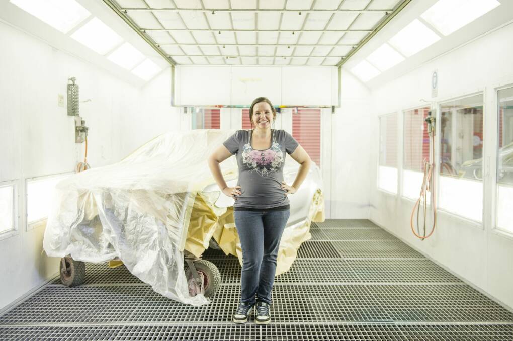 Vehicle spray painter Alex Roy's love of cars and art led her to a career in the traditionally male-dominated field. Photo: Jay Cronan