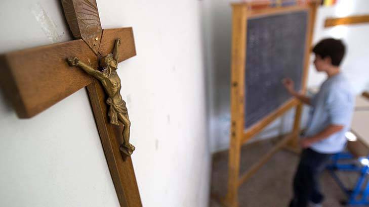 Principals want priests should back off from the day-to-day running of Catholic schools.  Photo: Reuters