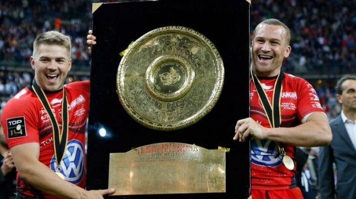 Winners are grinners: Drew Mitchell and Matt Giteau after winning a title for Toulon. Photo: AFP