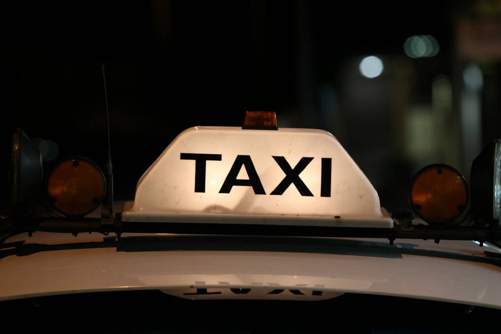Taxi surcharges for credit cards will be capped at five per cent from November. Photo: Ryan Osland