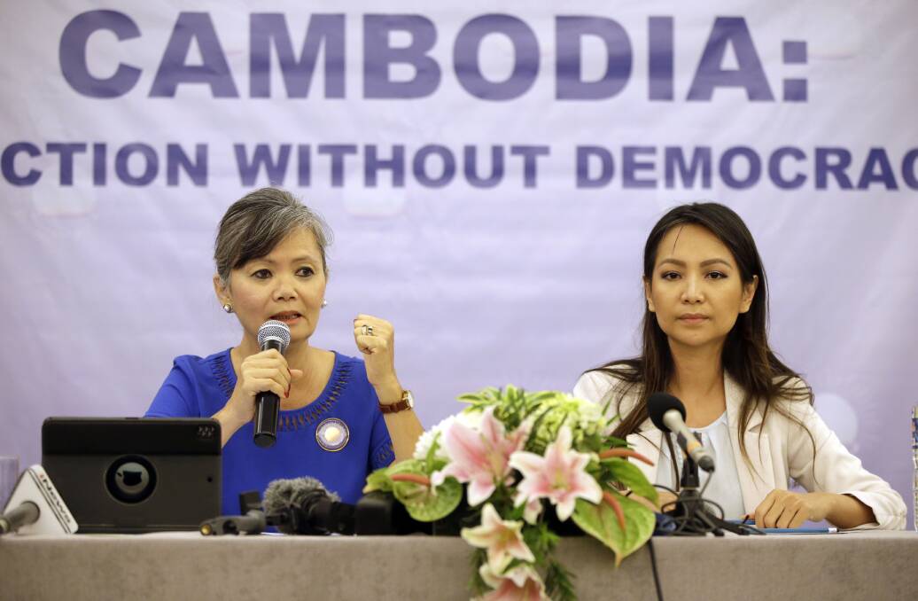 Vice-president of the Cambodia National Rescue Party (CNRP), Mu Sochua, left, speaks at a press conference with Monovithya Kem, CNRP Deputy Director for Foreign Affairs, in Jakarta on Monday. Photo: AP