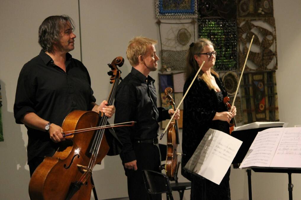 Red Note Ensemble members Robert Irvine (cello), Tom Hankey (viola) and Kathy Shave (violin) collaborating with The Griffyn Ensemble in Canberra. Photo: Supplied