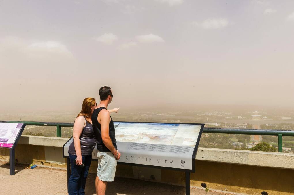 Dust settles over Canberra after strong winds bring particles from western NSW. Photo: Dion Georgopoulos