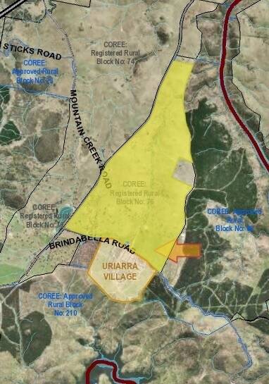 A map showing the site of the proposed Uriarra solar farm. The arrow shows the site planned by Elementus, directly across Brindabella Road from the village, but the company had approval to use any part of  the block outlined in yellow.