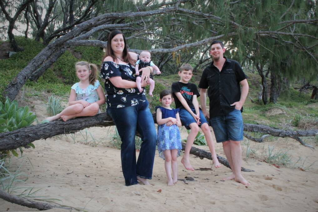 Stephanie and Karl Black and their four children have been forced to move several times after they lost almost everything in floods. Photo: Supplied