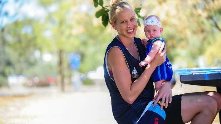 Canberra Capitals star Abby Bishop with her five-month-month old niece Zala. Photo: Katherine Griffiths
