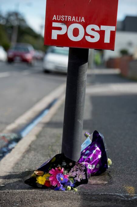 Flowers left for cyclist Peter McDuffie in Barkly St, West Footscray. Photo: Penny Stephens