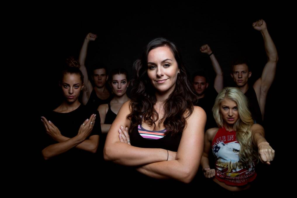 Michelle Barr in Sydney with dancers from We Will Rock You.  Photo: Janie Barrett