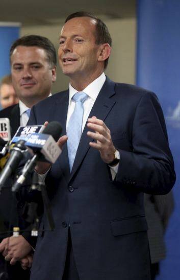 Prime Minster Tony Abbott has defended NSW Premier Barry O'Farrell. Photo: Sasha Woolley