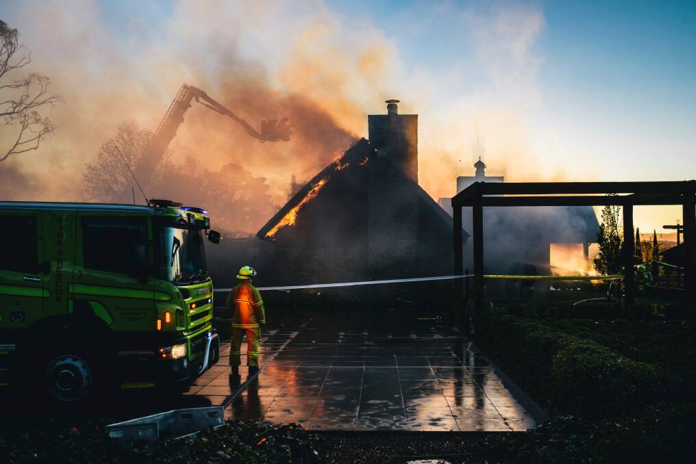 Emergency services battle a fire at Pialligo Estate Farmhouse Restaurant. Photo: Rohan Thomson