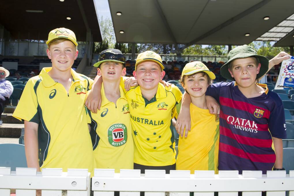 Jesse Rayner 11, Leo Gilchrist 12, Hamish McKee 11, Owen Gilchrist 10 and Bradley Weston are cheering on Australia at the Prime Minister's XI Vs South Africa 2018 game. Photo: Dion Georgopoulos