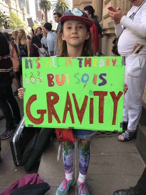 Mimi Vale, 10, spent hours making her placard for the rally. Photo: Henrietta Cook