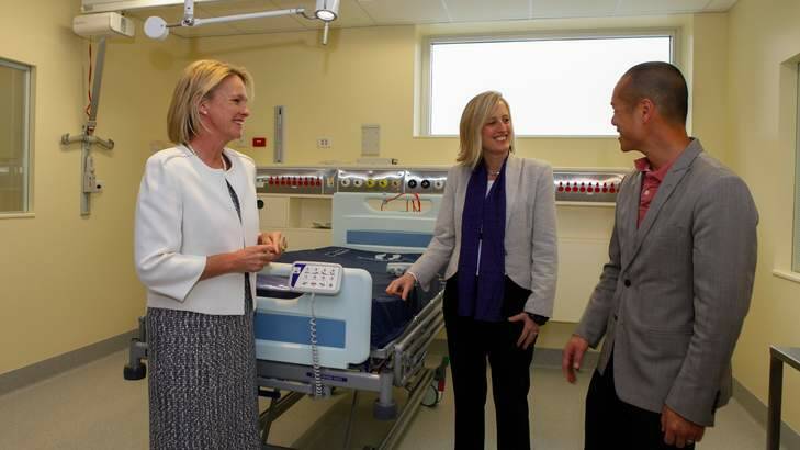 (right) Acting clinical director of ICU Dr Sean Chan talks to Fiona Nash and Katy Gallagher about the new facilities. Photo: Katherine Griffiths