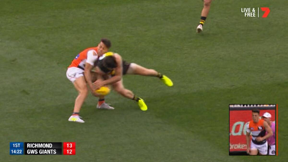 Concussed: The hit by Trent Cotchin that ended Dylan Shiel's preliminary final. Photo: Channel 7