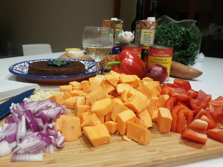 Ingredients get chopped while friendships are made.  Photo: Supplied
