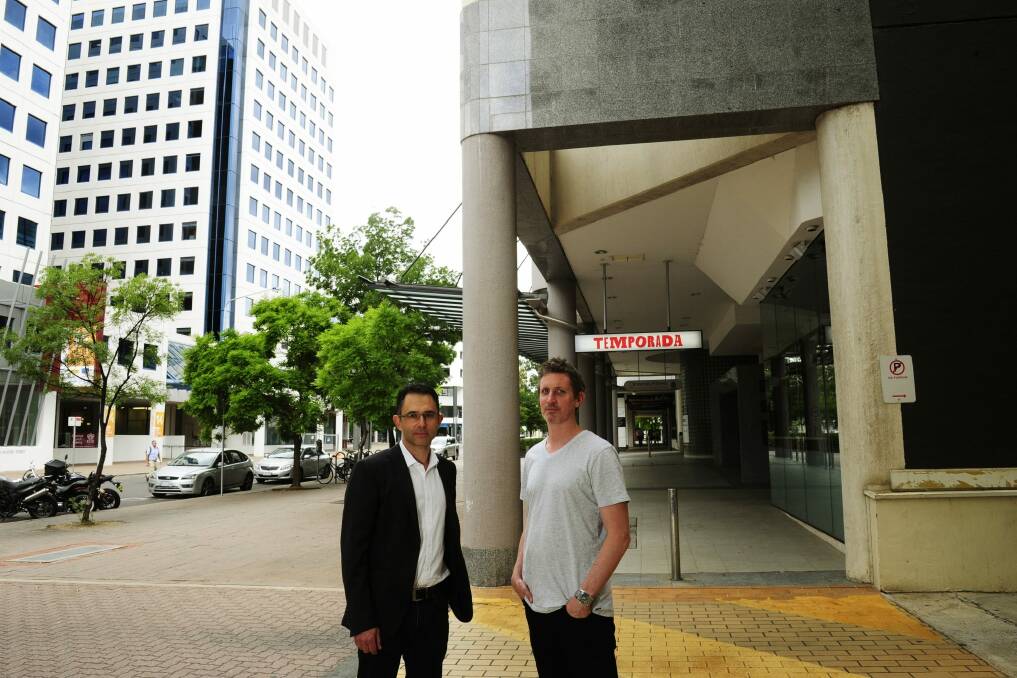 Property manager George Katheklakis and Temporada owner Ben Willis outside the restaurant in Moore Street, which has wide footpaths perfect for outdoor dining and a more vibrant streetscape. Photo: Melissa Adams