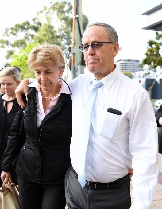 Dreamworld facilities supervisor Scott Ritchie (right) is seen leaving the Magistrates Court at Southport. Photo: AAP