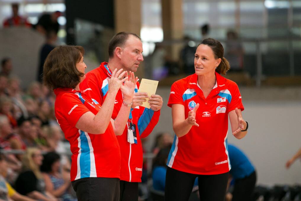 Back in town: Former Swifts coach Rob Wright with Megan Anderson (right) and Anita Keelan last year. Photo: Narelle Spranger