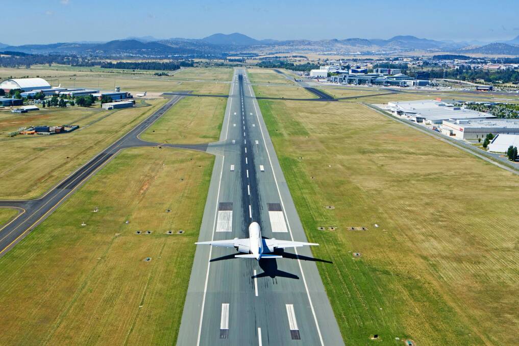 Flight paths from Canberra Airport's main runway are open and undeveloped, experts say.  Photo: Canberra Airport