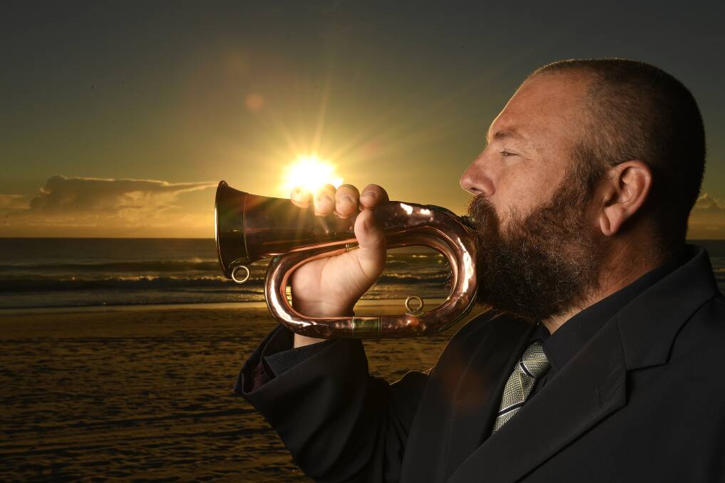 Adam Turner will play the bugle at the Anzac Day Dawn Service at Elephant Rock on Currumbin Beach tomorrow. Photo: Dave Hunt/AAP