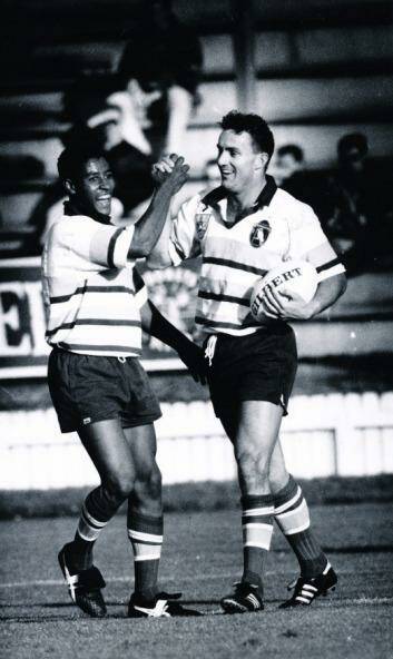 George Gregan and Dave Grimmond celebrate an ACT try in 1994.