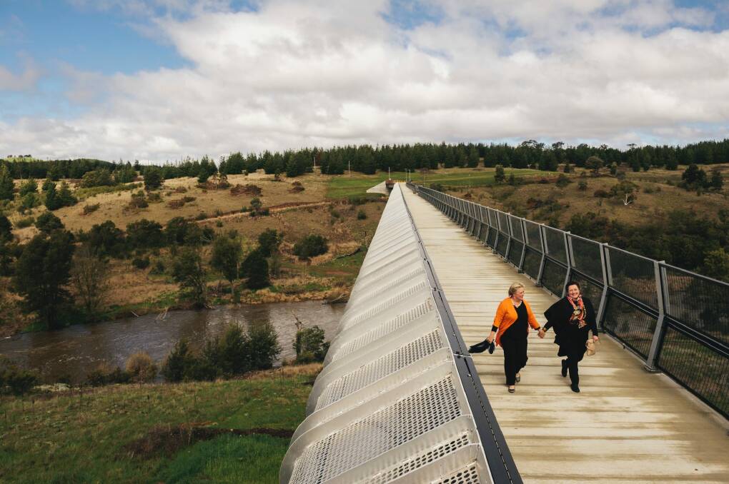 Granddaughters of Sir John Butters Penny Herold, left, and Angela Alcock at the opening of Butters Bridge over the Molonglo River. Photo: Rohan Thomson