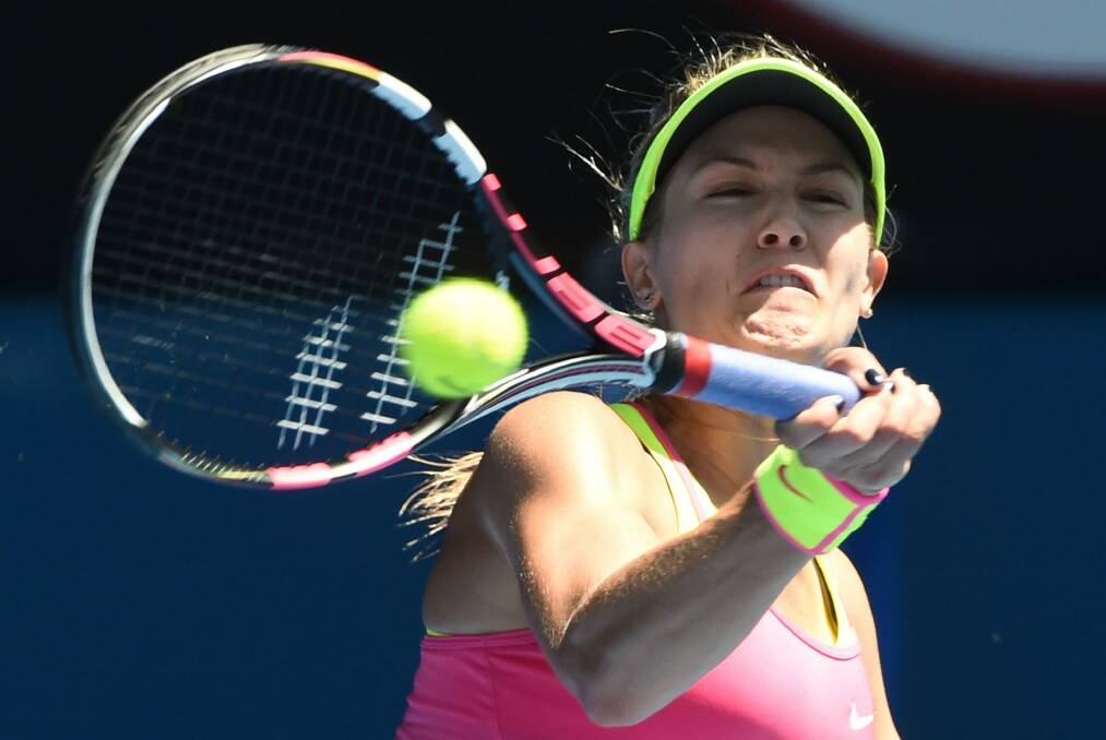 Canada's Eugenie Bouchard plays a forehand during her singles match against France's Caroline Garcia. Photo: AFP