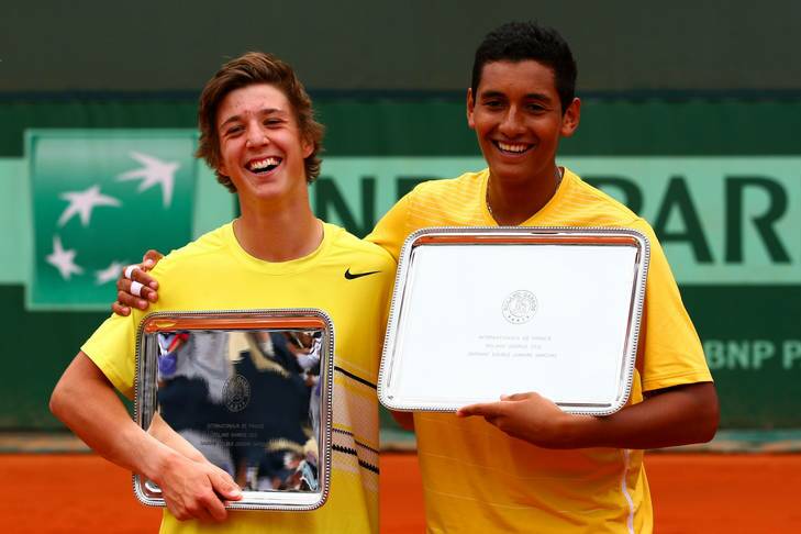 Canberra's Nick Kyrgios, right, and Andrew Harris of Victoria celebrate winning the French Open boys' doubles title. Photo: Getty Images