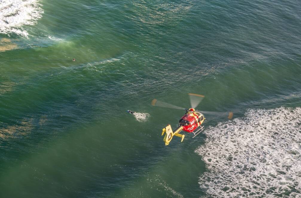 The Westpac Rescue Helicopter and two RACQ LifeFlight Rescue helicopters were involved in the search. Photo: Surf Life Saving Queensland - Twitter