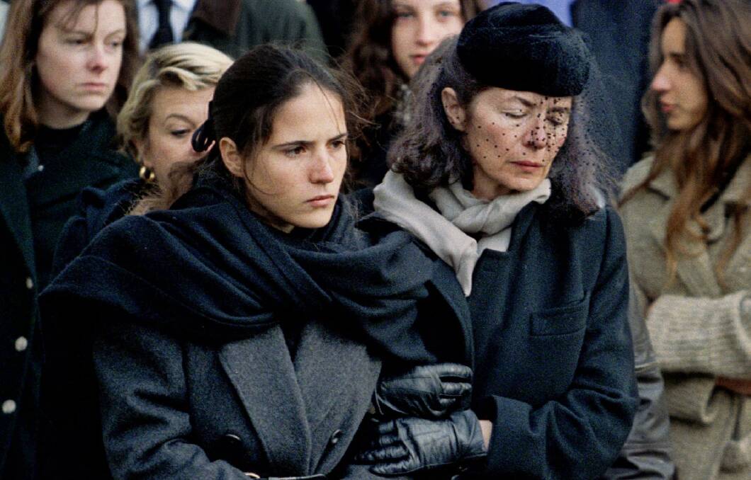 Anne Pingeot (right) with her and François Mitterrand's daughter, Mazarine, at his state funeral in 1996.