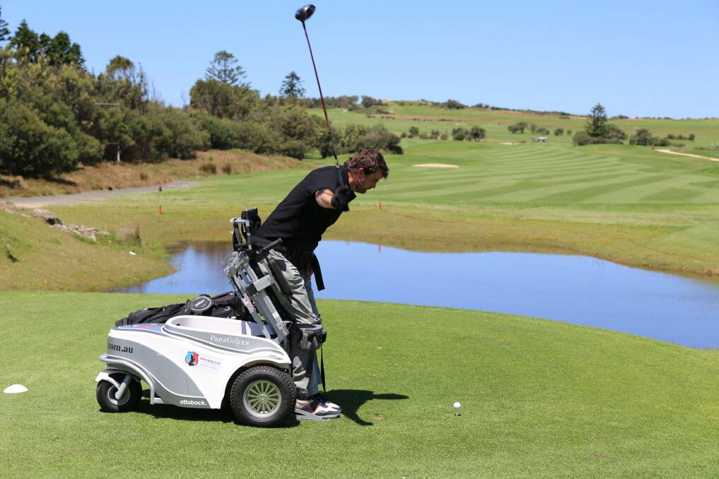 Founder of Empower Golf James Gribble demonstrates how the ParaGolfer works. 