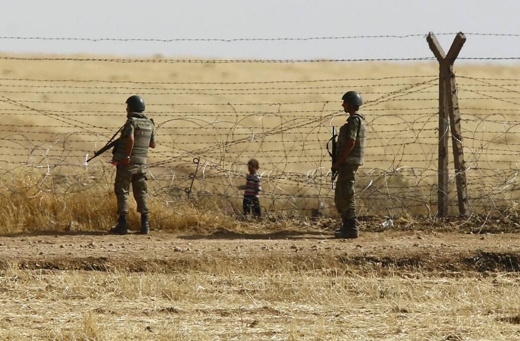The security fence on the Turkish-Syrian border, near the south-eastern town of Akcakale in Turkey's Sanliurfa province.  Photo: Reuters