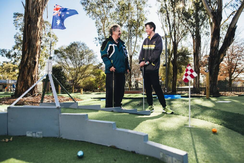 Chronicle
James Russell (15) with his uncle Kerry Russell at Yarralumla Play Station. They are holding the inaugural Canberra mini golf championships with a $6000+ prize pool.
14 July 2016
Photo by Rohan Thomson
The Canberra Times Photo: Rohan Thomson