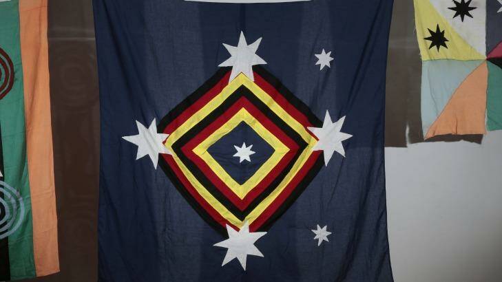  Subversive: The Kamilaroi flag, centre, by Archie Moore  at the Canberra Contemporary Art Space.  Photo: Jeffrey Chan