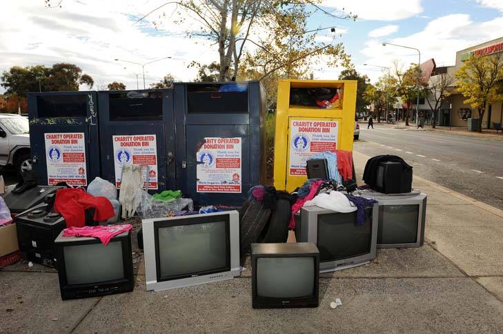 Not to be repeated ... government hopes the free recycling scheme will help end TV dumping around charity bins. Photo: Colleen Petch