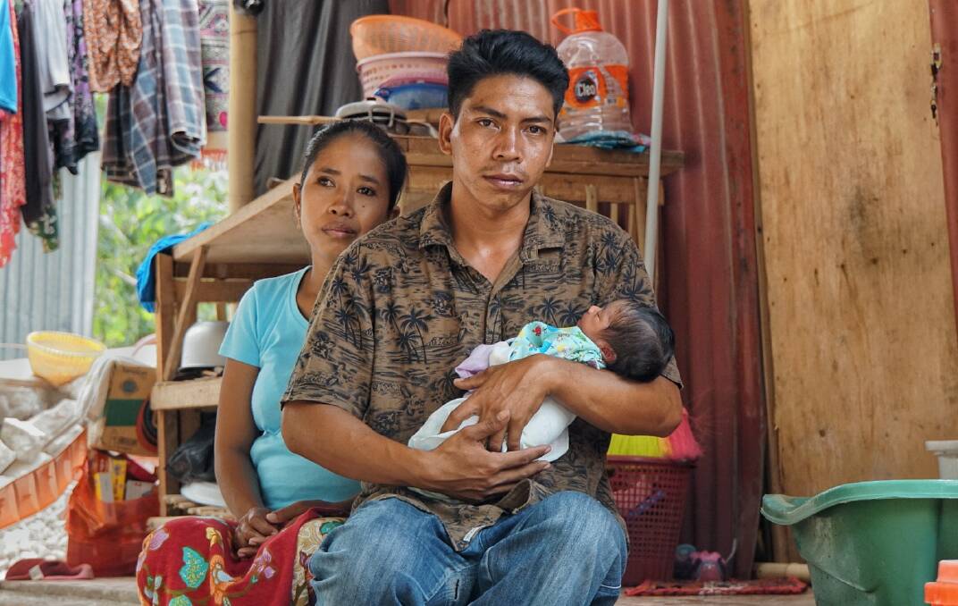 Hanan and his wife Reniatun with baby Akila, born since the earthquake. Photo: Amilia Rosa