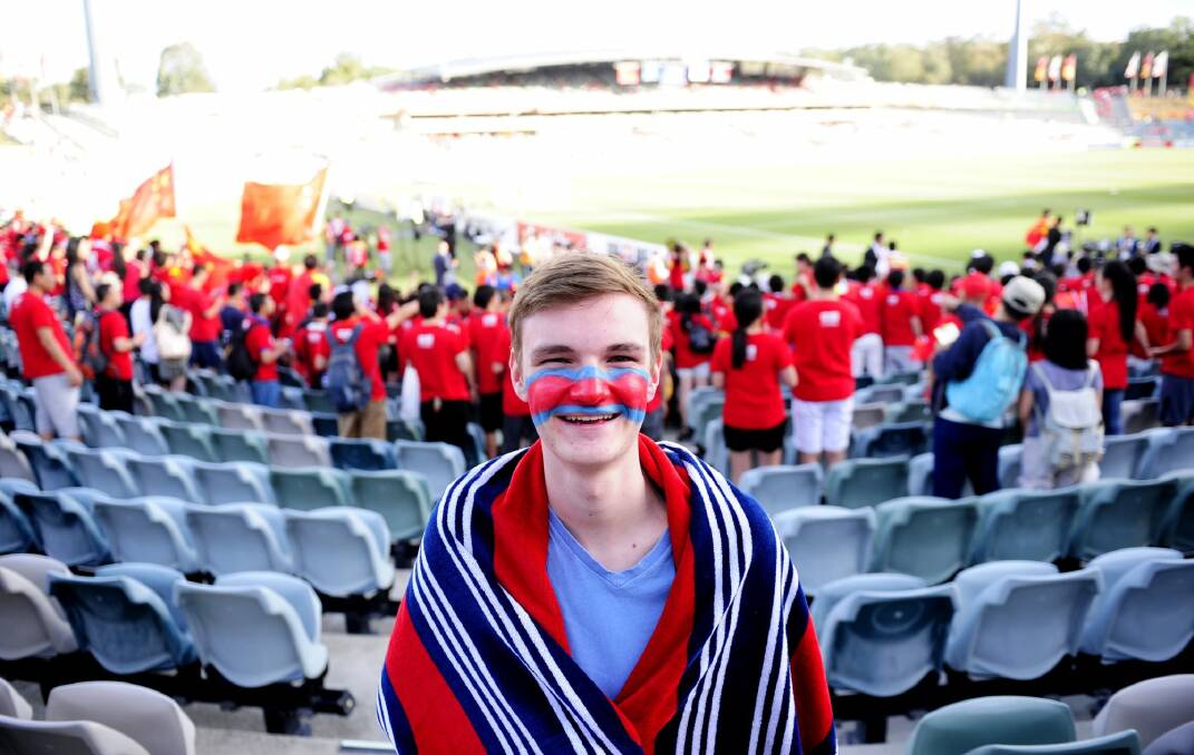 Oliver,16, at Canberra Stadium in Bruce to see China take on North Korea in the AFC Asia Cup. Photo: Melissa Adams