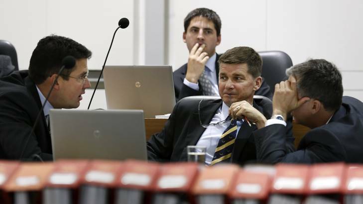 Opposition leader Zed Seselja chats with Brendan Smyth and Jeremy Hanson during Question Time on Tuesday. Photo: Jeffrey Chan