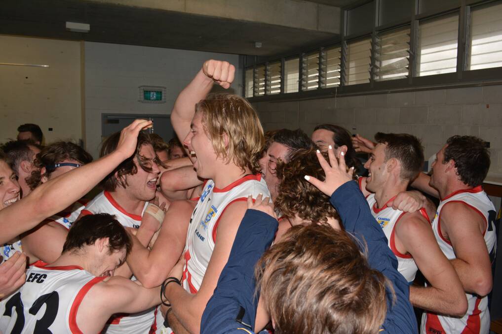 The Canberra Demons celebrate their first NEAFL finals win. Photo: Matt Corby/NEAFL