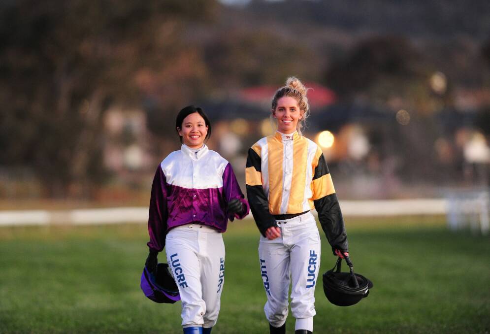 Canberra jockey Chynna Marston (right), pictured with Deanne Panya (left), will miss Canberra's Melbourne Cup race meeting after a fall on the weekend. Photo: Melissa Adams