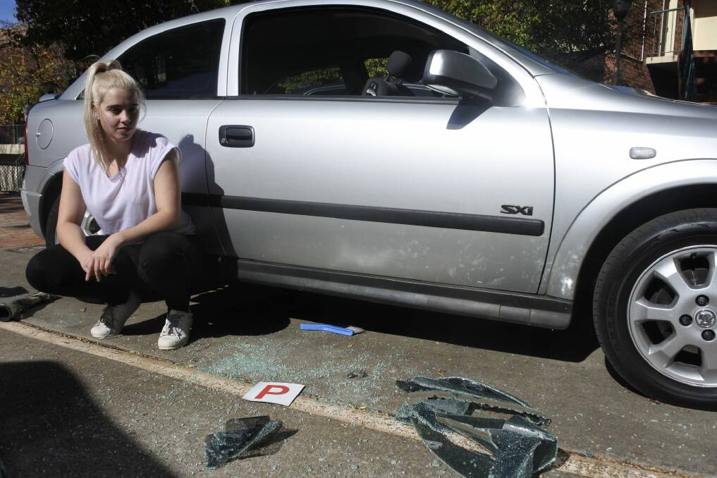 Aftermath of a car break-in on Jerrabomberra Avenue, Narrabundah on Thursday night Photo: Clare Sibthorpe