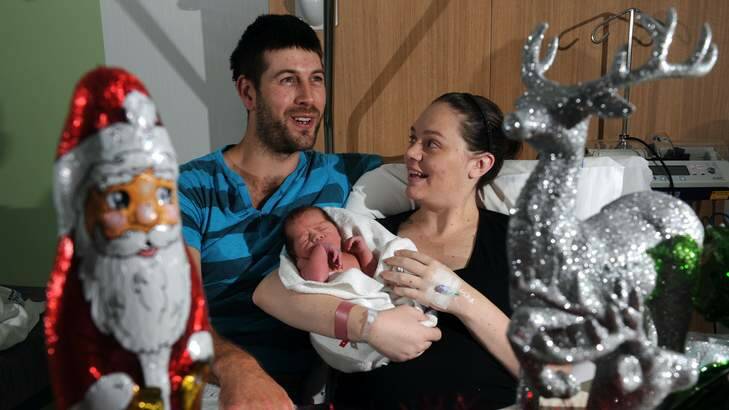 The Canberra Hospital's first Christmas baby, born at 1.55 am to proud parents, Rhys Bingley, 28 and Jane Waller, 22, of West Queanbeyan. Photo: Graham Tidy