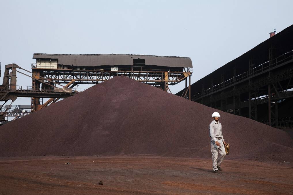 Prime Minister Tony Abbott appears to have cooled on the idea of an iron ore inquiry amid apparent divisions in cabinet over the issue. Photo: Bloomberg
