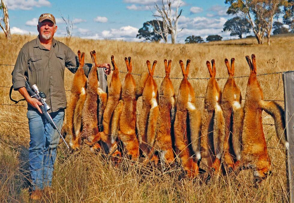 Sports shooter and Silva Fox whistle proprietor Ron Kiehne with 10 shot foxes. Photo: Supplied