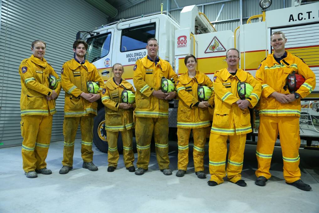 Members of the ACT Rural Fire Service’s Molonglo brigade will be competing in this month's Tough Mudder in Sydney. From left: Cassy Voght, Ollie Taylor-Helme, Bernadette O'Kelly, Brett Vey, Katherine Jenkins, Tony Greep and Lyall Marshall. Absent team members: Brooke Turner, Maurice Giesen, Deborah Moger Smith. Photo: David Tunbridge
