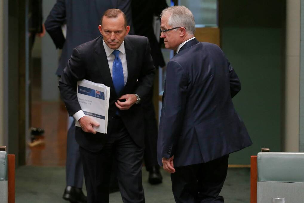Mr Abbott and Mr Turnbull in Parliament on Monday. Photo: Alex Ellinghausen