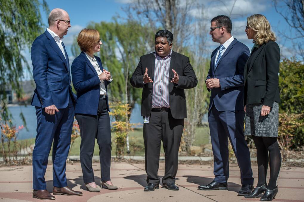 Director of palliative care Dr Suharsha Kanathigoda, (centre) with Snow Foundation's Stephen Byron, Minister for Health and Wellbeing Meegan Fitzharris ACT Senator Zed Seselja and Snow Foundation chief executive Georgina Byron. Dr Kanathigoda said getting news of the expansion made today the happiest of his life.
 Photo: Karleen Minney